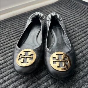 Tory Burch Black Flats with Gold Emblem